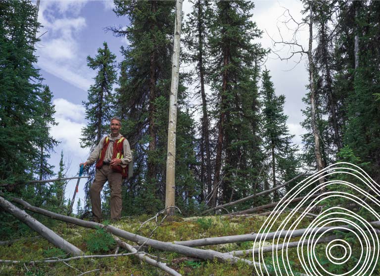 Archaeologist in forest